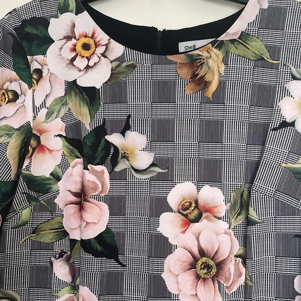 Black and white dress with pink flowers.